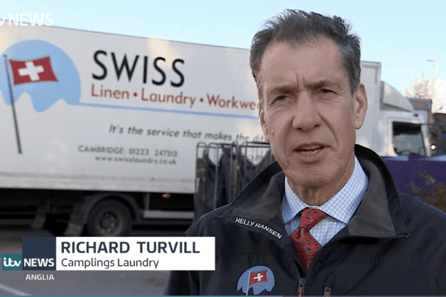 Richard turvill in front of a swiss truck.